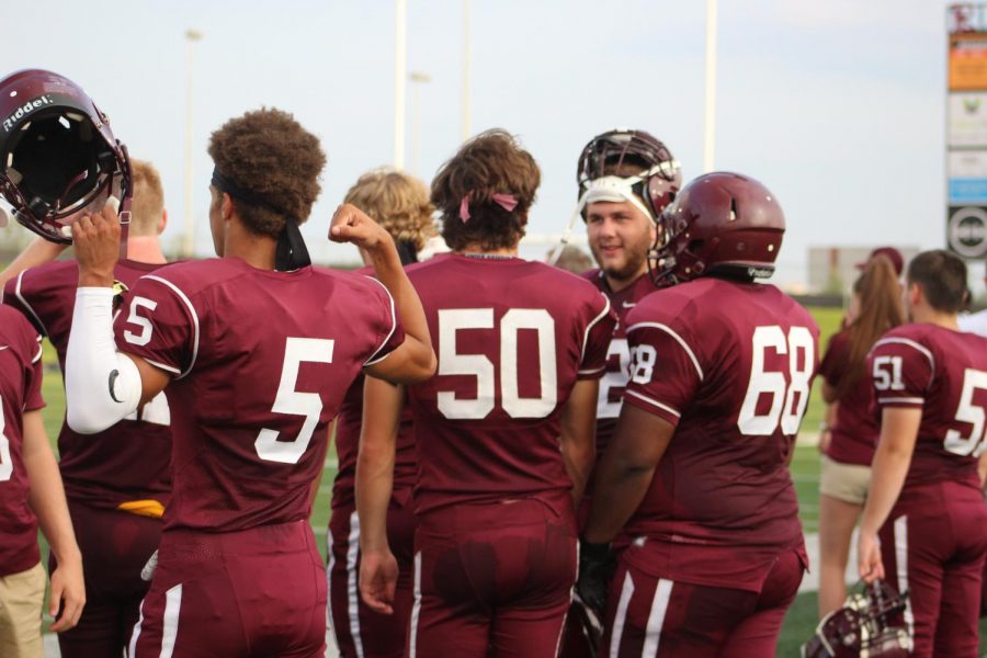 Junior Frankie Allen Flexes moments before the scrimmage game starts