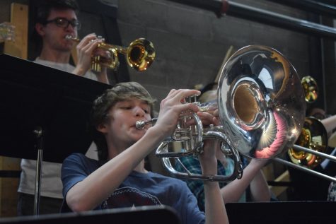Caleb Digiacomo plays the mellophone along with the other show band members for the varsity show choir, Free Spirit.