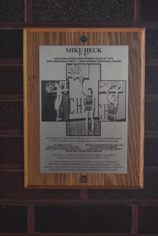 This Mike Heck plaque hangs directly across the North Gym. Not many students know the story of Mike Heck, but its one that should be shared.