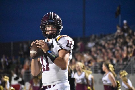 Lane Harris warms up before the second half Thursday night against Papillion La Vista South.