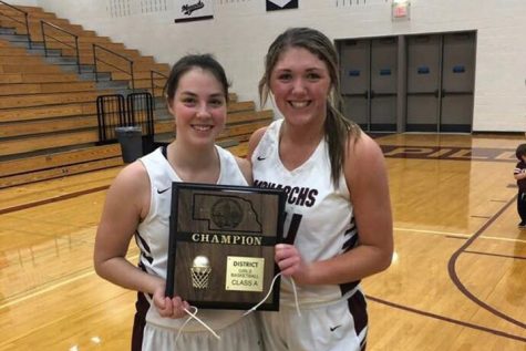 Lindsey Ingwerson and Olivia Boudreau pose together after winning the District Finals last year.