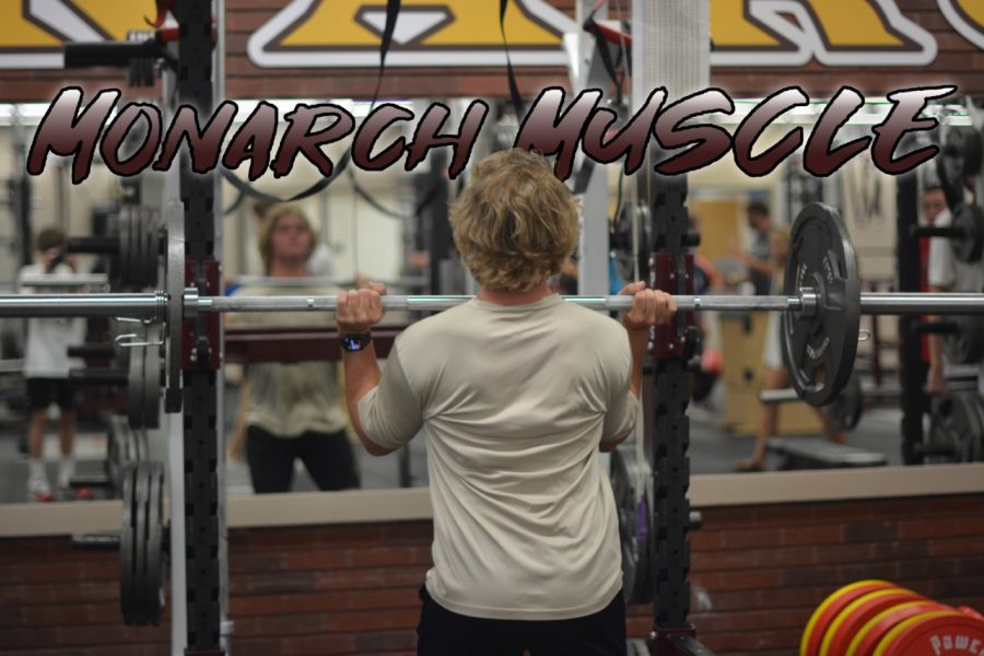 Senior Hunter Scruggs hang cleans during his weights class.