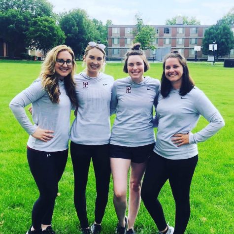 The four new cheer coaches prepare for day one of cheer camp, 2019.