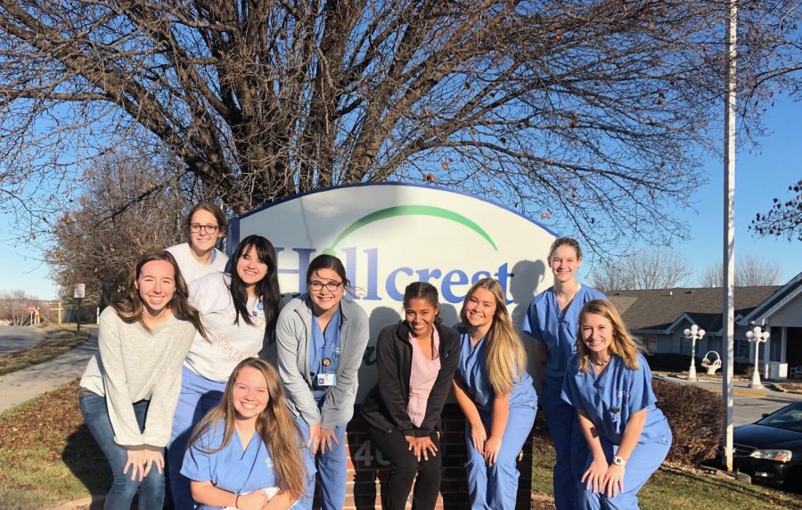 Some seniors from PLHS and PLSHS that are in the Health Academy pose in front of Hillcrest, an assisted living home, after the academys weekly service learning.