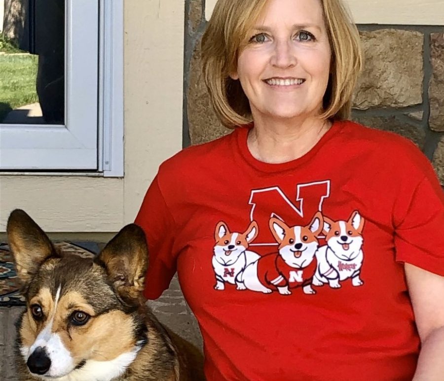 Herbener+sits+with+her+dog%2C+Ollie.+She+is+a+UNL+alum.