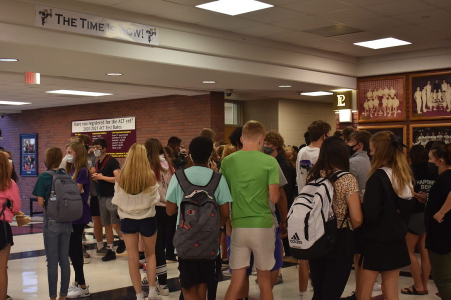 Large group eagerly waits to be released from lunch. Big gatherings like this make the future of PLHS uncertain. 