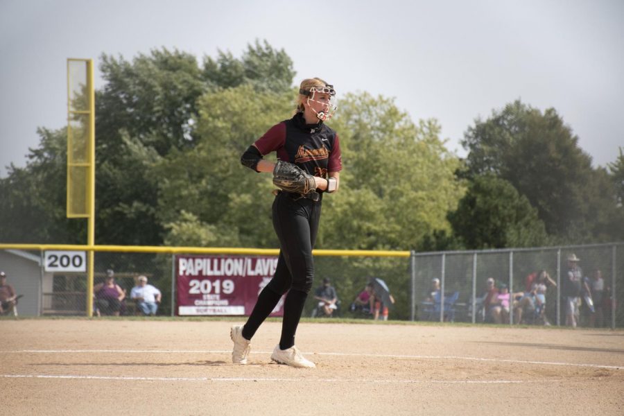 Senior Jordyn Bahl gets ready to pitch in a game against Lees Summit North High School from Missouri. The Monarchs went on to win the game 3-1.