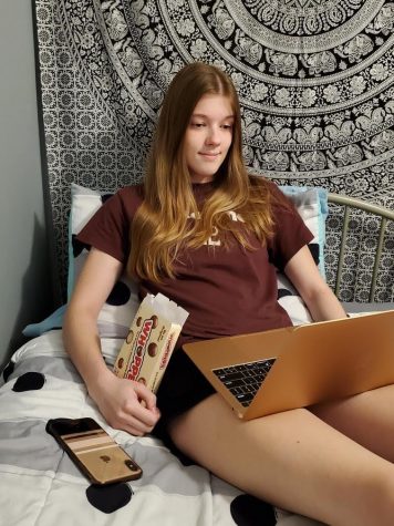 Meagen Grigatis is watching netflix and eating her whoppers.