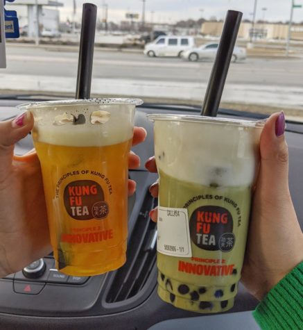 Pictured are drinks from the popular boba shop Kung Fu Tea. To the left is mango green tea with mango jelly and to the right is the matcha milk cap with tapioca.