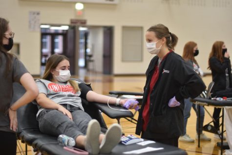 Sophomore Aubrey Armstrong donate blood to help the community.