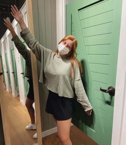 Aerie worker Mia Rathbun poses in her work attire that they are required to wear every day. She is wearing Aerie’s Weekend Pretty Back Sweatshirt and their Real Me Crossover Tennis Skirt.
