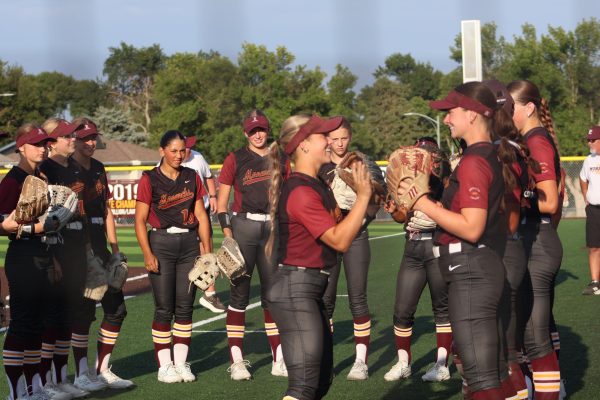 Senior Maizey Carpenter and junior Alexa Taylor prepare to take the field against Elkhorn South on August 26th. The Monarchs beat the Storm 4-0. 