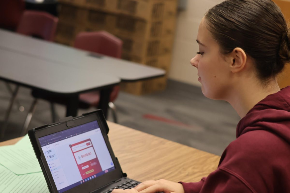 Senior Mackenzie Frederick uses the Securly app on her school chromebook. "Securly started off as a hassle, but is now easy to use," Frederick said. 