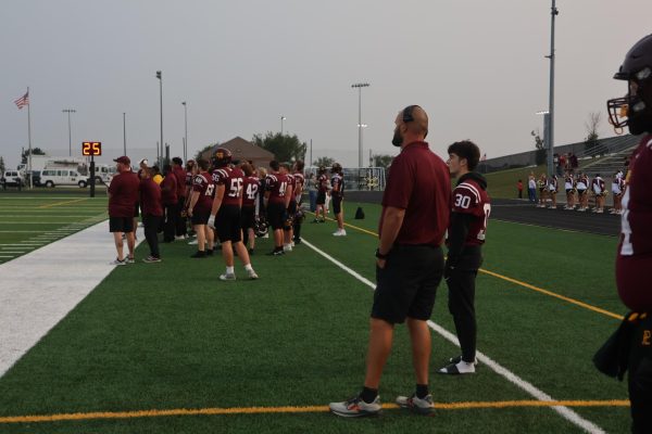 Kage coaches at a PLHS home game against Lincoln North Star. 