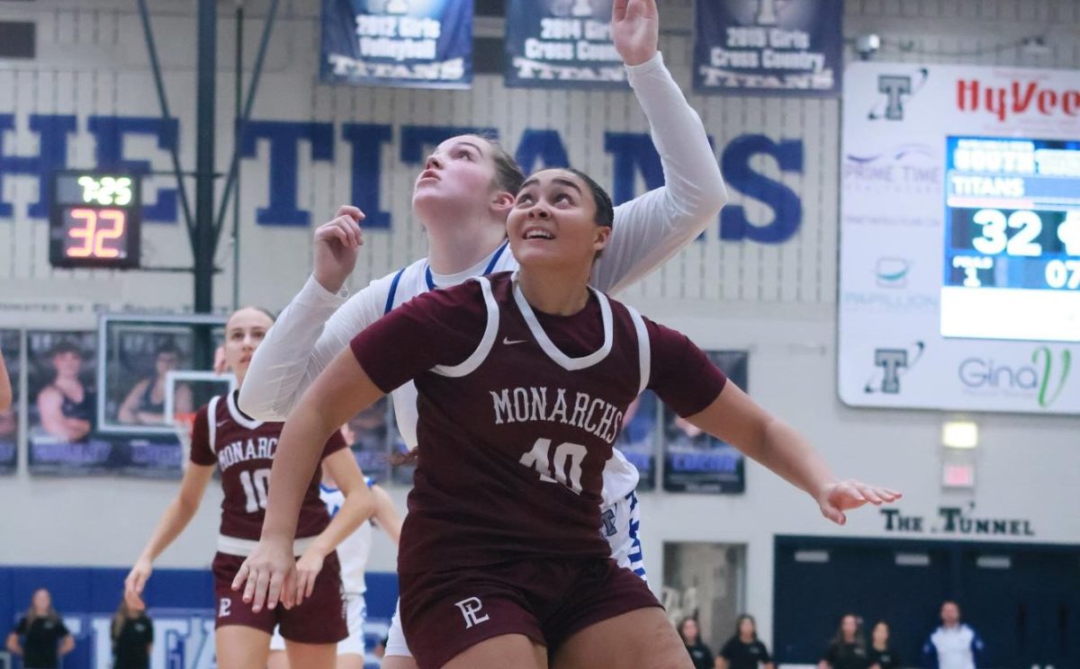 Corryn Estelle gets ready to rebound the ball against the Titans on January 9th. The Monarchs won 58-50.