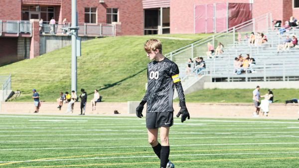 Junior captain Zack Carlson paces in front of the goal during a home game against North Platte.