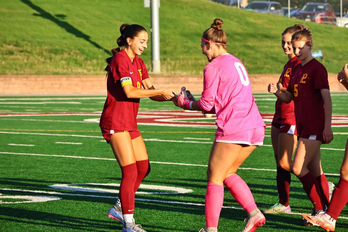 The girls soccer team defeats Omaha South on senior night 6-0. The team recognized five seniors including Romy Olson and Adeline Bosiljevac pictured.