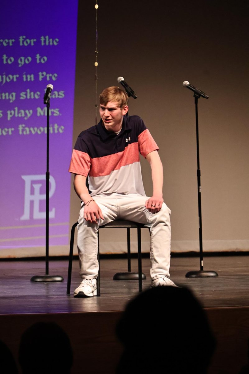 Senior Duncan Barragan sings in front of International Thespian Society members and inductees on May 6.
